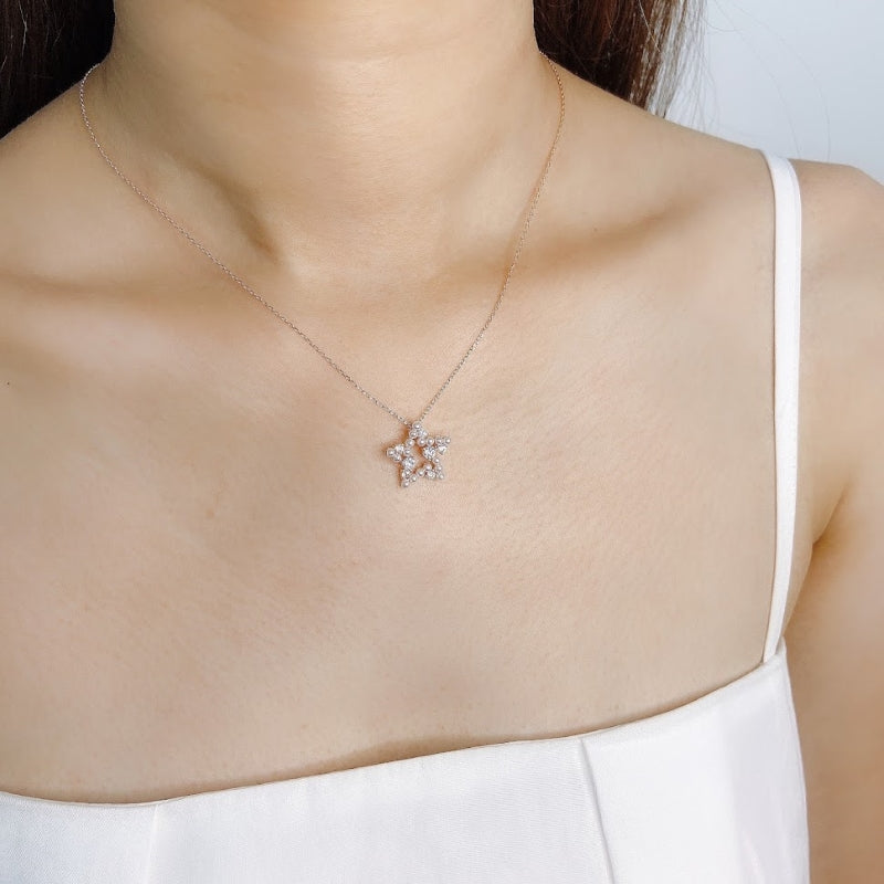 White gold star pendant on sale necklace